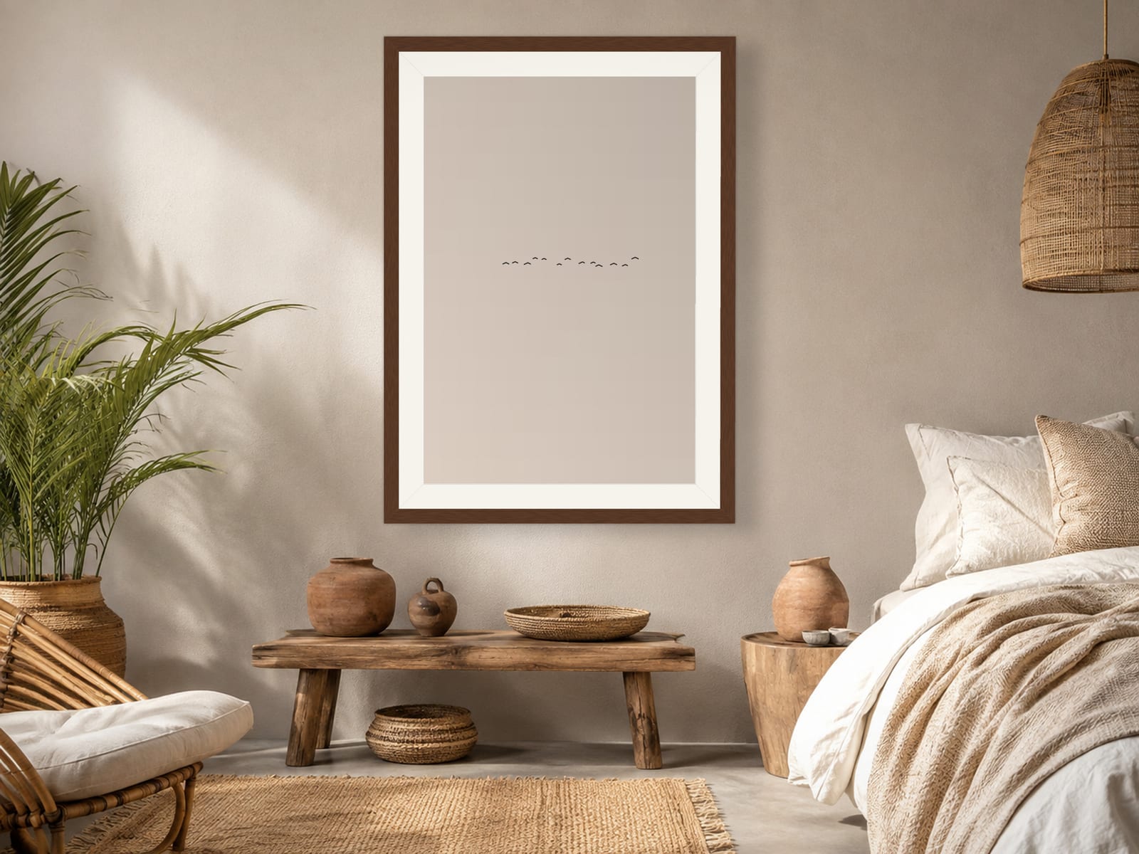 Boho Ochre No. 005, neutral minimalist composed silhouettes wall art print in a walnut frame, hanging in a boho bedroom